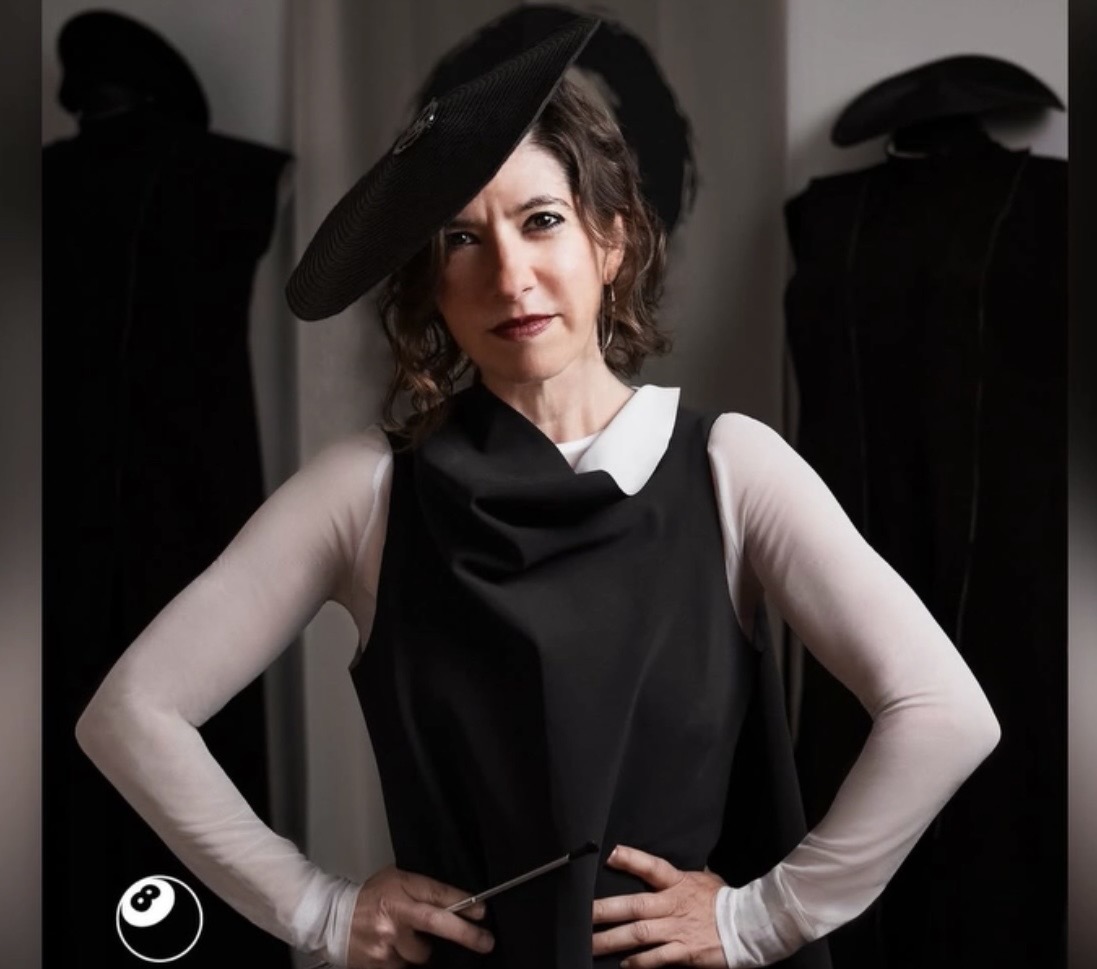Lady Kendra wearing a sculptural black and white design